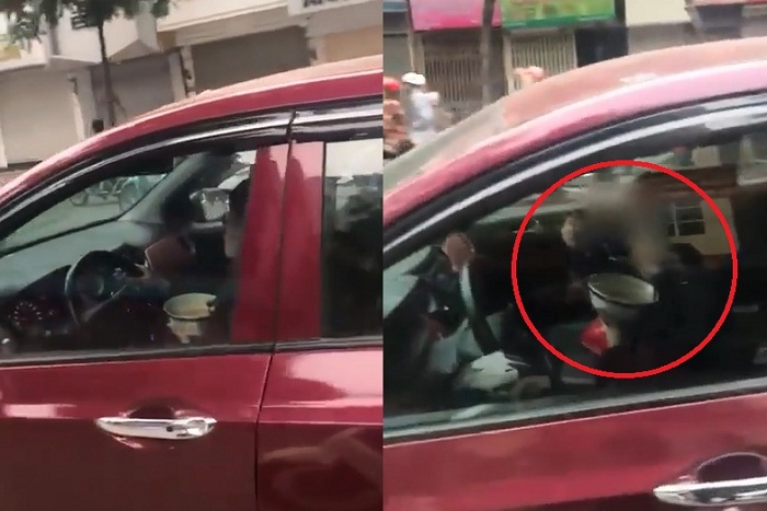 Phẫn nộ nữ tài xế vừa cầm bát ăn vừa lái xe ôtô trên đường phố HN