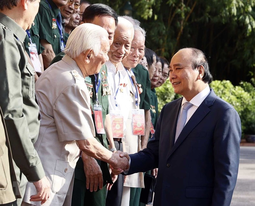 Chủ tịch nước gặp mặt Đoàn đại biểu Hội Cựu thanh niên xung phong | Chính trị | Vietnam+ (VietnamPlus)