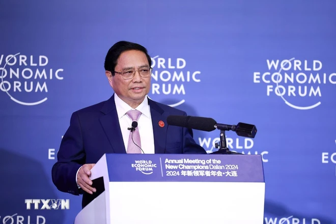 Thủ tướng Phạm Minh Chính đối thoại với Chủ tịch WEF và các doanh nghiệp - Ảnh 2.