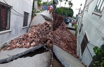 Hà Nội: Đường bê tông bất ngờ lún sâu kéo theo ngôi nhà 2 tầng