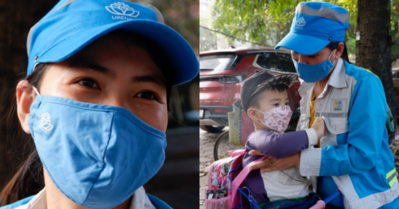 Tết đặc biệt, ấm áp của bé trai 2 tuổi theo chân mẹ thu gom rác ở Hà Nội