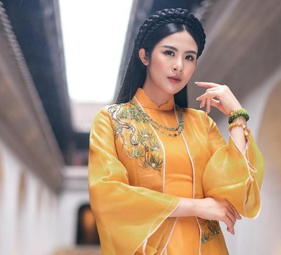 Hoa hậu Ngọc Hân khoe nhan sắc xinh đẹp, quyến rũ với áo dài trong bộ ảnh mới