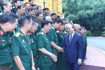 Chủ tịch nước Nguyễn Xuân Phúc tiếp đại biểu cựu chiến binh Mặt trận Vị Xuyên - Hà Tuyên