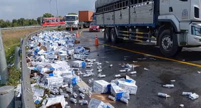 Hàng trăm thùng bia đổ xuống đường trên cao tốc TP.HCM - Trung Lương