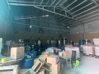 Đường dây sản xuất, mua bán nước giặt giả quy mô lớn tại Hà Nội