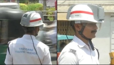 Ấn Độ: Cảnh sát dùng mũ điều hoà chống chọi với nắng nóng